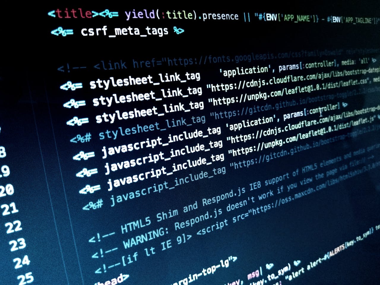 Detailed view of HTML and JavaScript code displayed on a computer monitor.